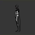 Man Wearing Black and White Batman Costume with Cape Standing on Gray Background