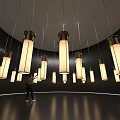 Art Installation Featuring Glowing Long Hanging Lamps And Person In Dark Interior Space