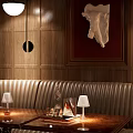 Modern Bar Interior Featuring Wooden Panels Leather Seats And Pendant Lights