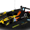 Dallara Race Car In Yellow Black Orange Livery With Number 49 Richard Mille
