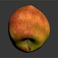 Red And Yellow Apple With Stem On Dark Reflective Surface