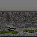 Natural Stone Mosaic Landscape Wall With White Top Trim Green Shrubs And Gravel Ground