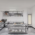 Commercial Kitchen Interior With Stainless Steel Workbench Range Hood Refrigerator And Food Plates