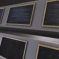 Modern Air Conditioner Vents With Gold Borders And Black Grilles On Wall Surface