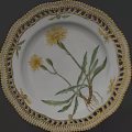 Elegant Ceramic Plate With Golden Intricate Lace Border And Yellow Floral Design