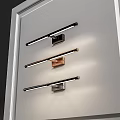 Three Different Color Linear Wall Lamps With Black Copper Gray Bases Mounted On White Wall