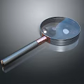 Magnifying Glass With Metal Handle Clear Lens And Reflective Surface For Detailed Observation