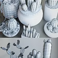 Decorative Cactus And Succulent Potted Plants In Various Ceramic Pots On Shelf