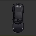 Dark Sports Car With Rear Spoiler Shiny Exterior And Stylish Alloy Wheels