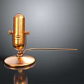 Golden Microphone With Stand Base And Extended Cable On Dark Background