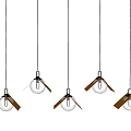 Five Modern Minimalist Pendant Lights With Spherical Glass Shades Hanging In Interior