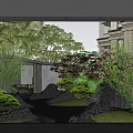 Courtyard Garden with Lush Green Plants Rocks and Trees in Building Background