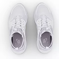 White Athletic Shoes With Mesh Upper Breathable Design And Lightweight Sole