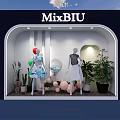 MixBIU Storefront Window Display With Mannequins Clothing Balloons And Green Plants Elegant Lighting