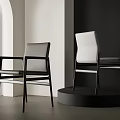 Modern Minimalist Black And White Leisure Chairs In Contemporary Archway Setting
