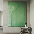 Large Green Abstract Painting On Gray Wall With Small Table White Vase And Books