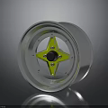 Automotive Car Wheel Part With Silver Outer Rim And Yellow Star Shaped Center