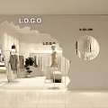 Modern Clothing Store With White Wall Irregular Display Window Hanging Clothes And Display Racks