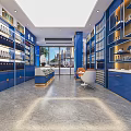 Blue Themed Specialty Store Interior With Shelves Display Cabinets White Chairs And City View
