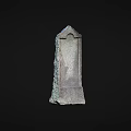 Vertical Ancient Stone Stele With Intricate Carved Texture And Historical Design