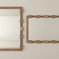 Two Wooden Framed Mirrors with Golden Decorative Blocks Hanging on Light Colored Wall