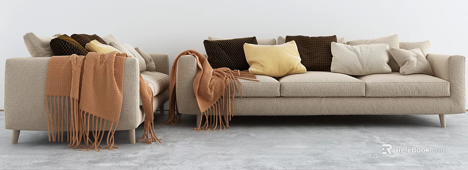 Modern Beige Three Seater Sofa With Multicolored Throw Pillows And Brown Draped Blanket 3d model 