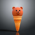 Orange Bear Head Shaped Ice Cream In Waffle Cone Isolated On Gray Background