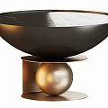 Bowl Shaped Black Coffee Table with Golden Sphere Base and White Vase Holding Flowers