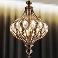 Elegant Intricate Curved Metal Chandelier With Crystal Glass Bulbs And Warm Illuminated Light