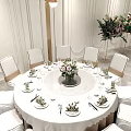 Elegant Banquet Hall Interior With White Chairs Brown Ribbons Flower Arrangements And Arched Windows