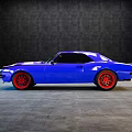 Blue Classic Sports Car With Red Wheels On Gray Floor Dark Background