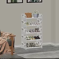 White Multi Tiered Shoe Rack with Shoes Handbag and Potted Plant on Top Shelf