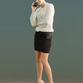 Woman in Standing Pose Wearing White Shirt and Black Skirt with Gradient Green Background