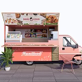 Pink Rumahfood Food Truck Offering Street Food With Outdoor Seating And Menu