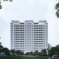 Modern Tall Residential Buildings With Lush Greenery Outdoor Seating And Parking Lot