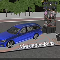 Blue Mercedes-Benz Car on Illuminated Display Platform With Stage Lights And Background Trees
