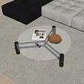Modern Round Glass Top Coffee Table With Black Metal Legs Gold Bowl And Magazine