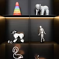 Variety of Assorted Dolls Displayed on Black Shelves Including Flamingo Elephant and Car