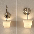 Modern Wall Lamps with Metal Base and White Textured Shades Illuminated on Light Wall