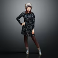 Woman Wearing Floral Dress Hat Black Tights And Silver Boots Standing With Hand On Hip