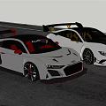 Silver Audi and White BMW Sports Cars with Aggressive Design Rear Spoilers Red Seats