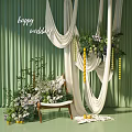 Floral Installation for Wedding with Green Backdrop White Drapery Yellow Fruits and Wooden Chair
