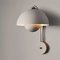 Stylish Modern Wall Lamp With Dome Shade And Circular Base Illuminated On Wall
