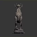 Silver Deer Shaped Sculpture With Intricate Patterns Curled Antlers And Decorative Base