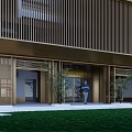 Modern Entrance Gate Featuring Golden Vertical Slats Grandiardo Sign Plants and Person