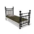Ornate Black Metal Single Bed With Dark Green Mattress And Patterned Pillow