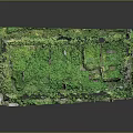 Ancient Stone Ruins Structure With Overgrown Green Moss Vegetation And Weathered Walls