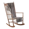 Comfortable Leisure Rocking Chair With Wooden Frame Woven Seat And Gray Knitted Blanket