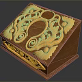 Wooden Decorative Box With Golden Intricate Carvings And Ornate Surface Design