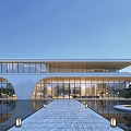 Modern Architectural Building With Large Glass Facade Reflective Pool And Stone Pathway